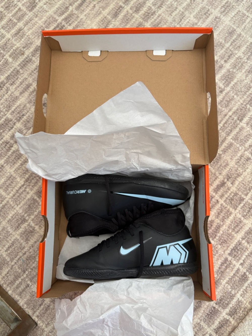 Nike Black Indoor Soccer Shoes with Light Blue Accents